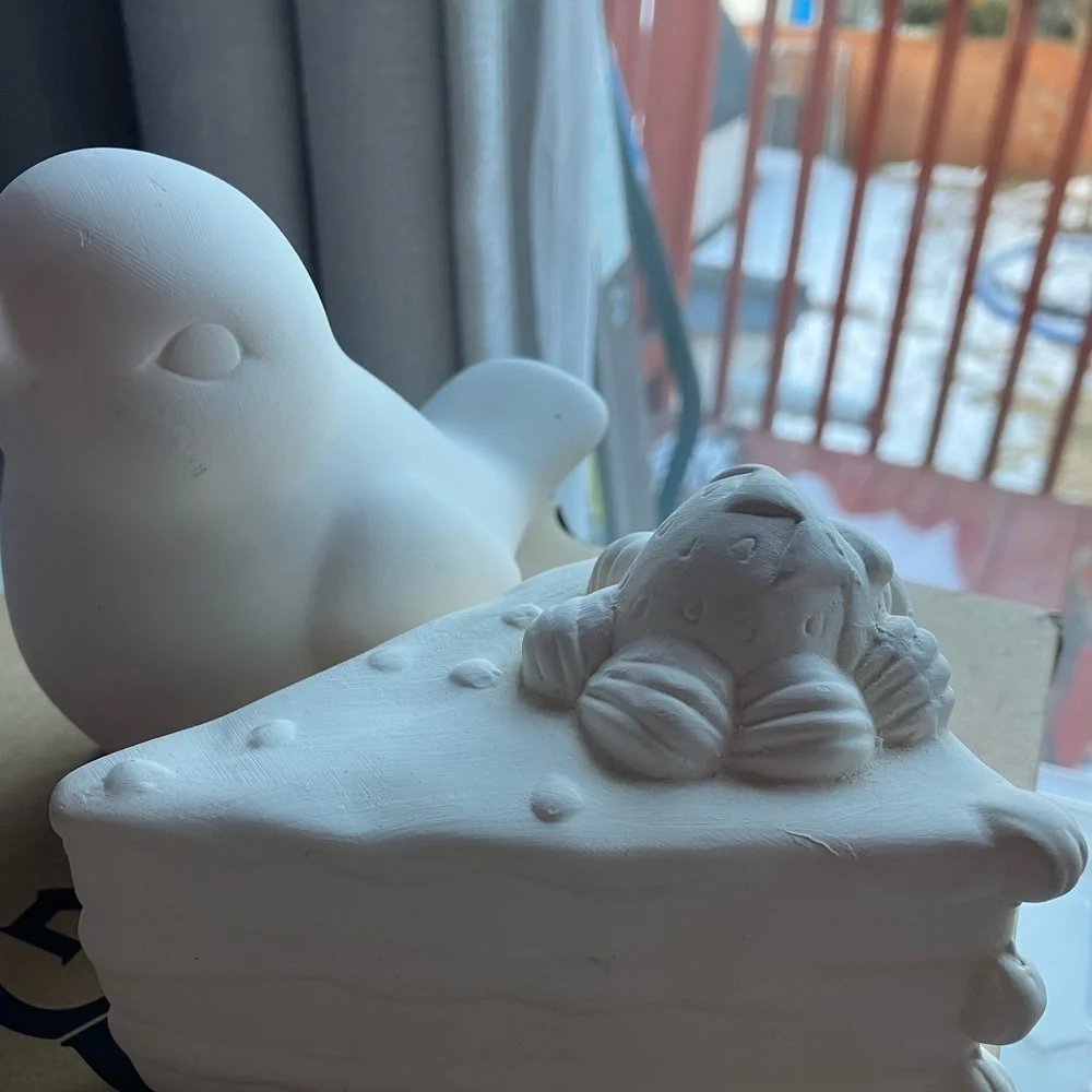 Unpainted bisque ceramic unfinished bird and strawberry cake figurines pottery